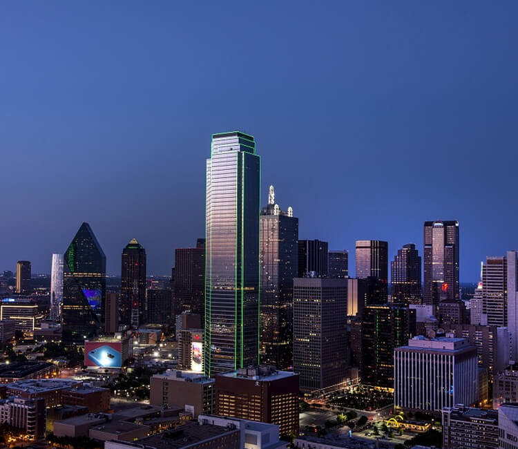 Dallas skyline at night, showcasing North TX Process Service's coverage of legal document delivery and court filing services across Dallas and surrounding cities.